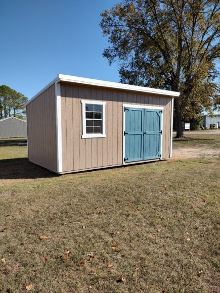 Has rear slanted roof and comes with 70" double wood doors with added door paint